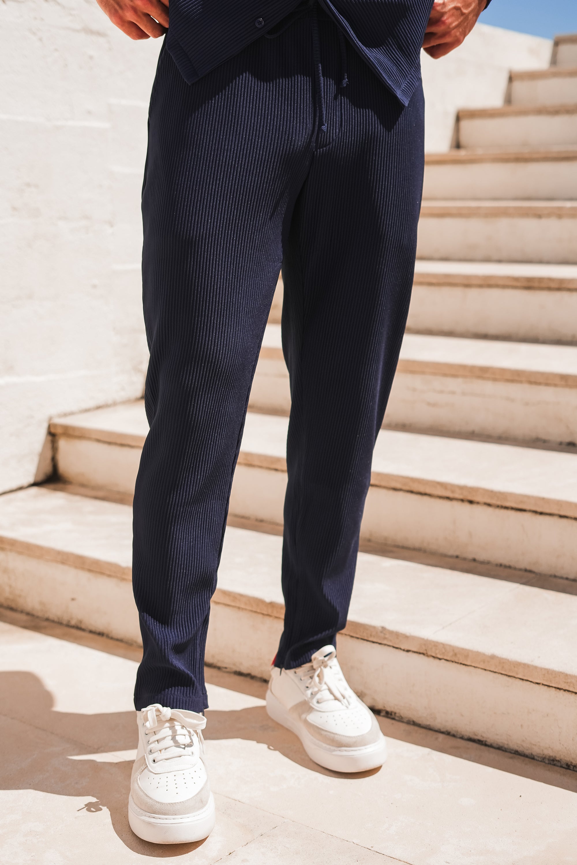 THE ICON. X ROSS CAMPBELL PLEATED TROUSERS - NAVY BLUE