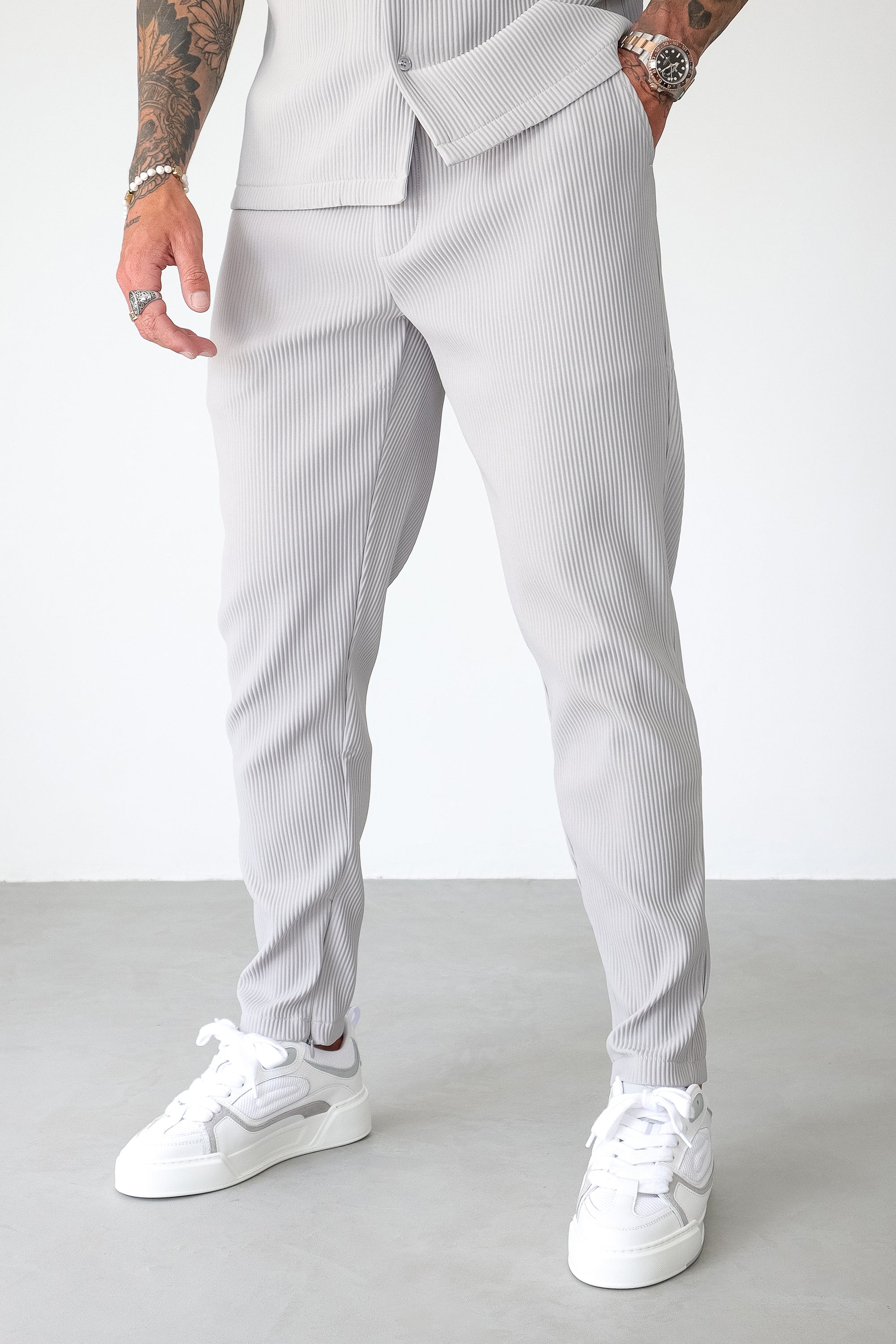 THE ICON. X ROSS CAMPBELL PLEATED TROUSERS - GREY