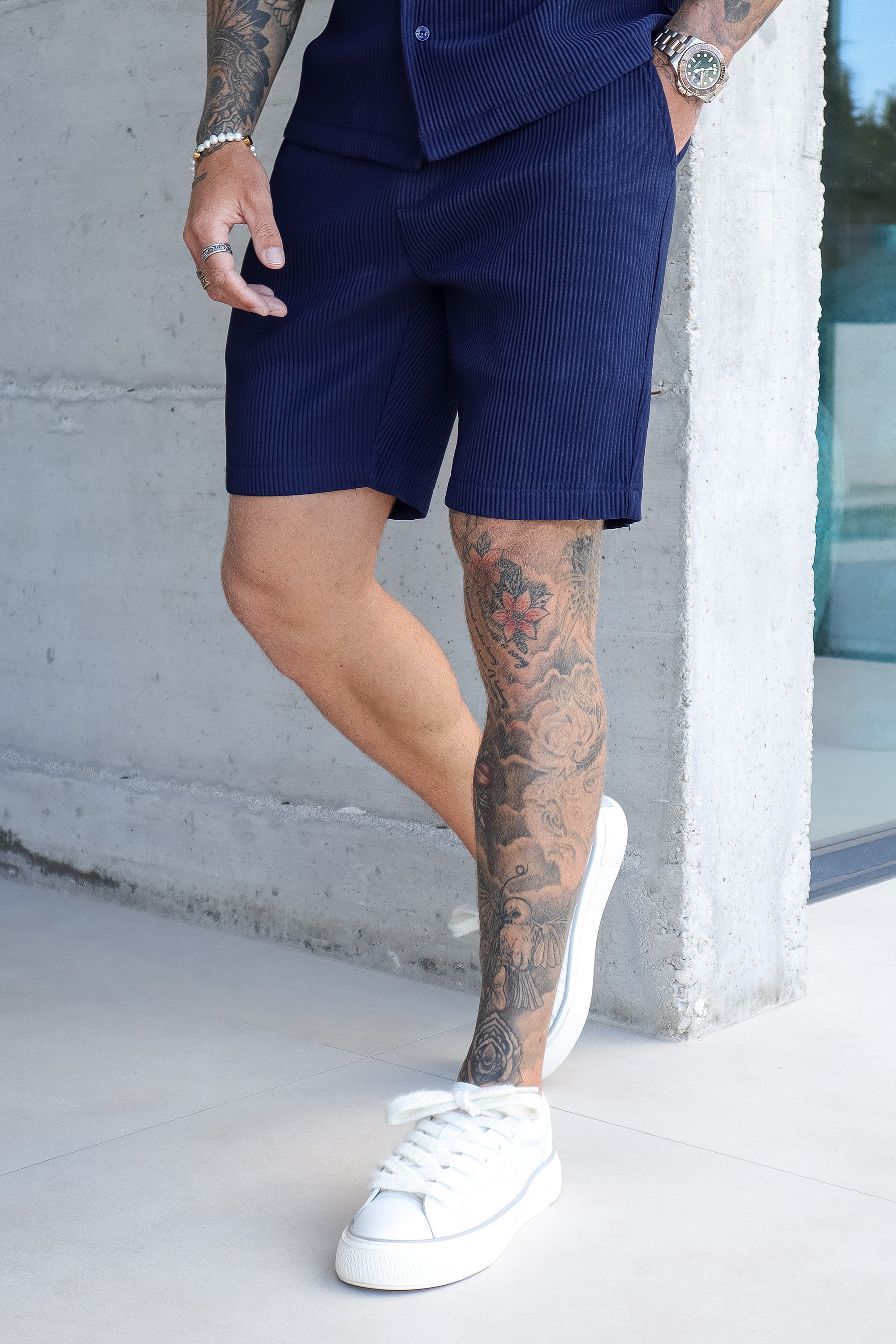 THE ICON. X ROSS CAMPBELL PLEATED SHORTS - NAVY BLUE