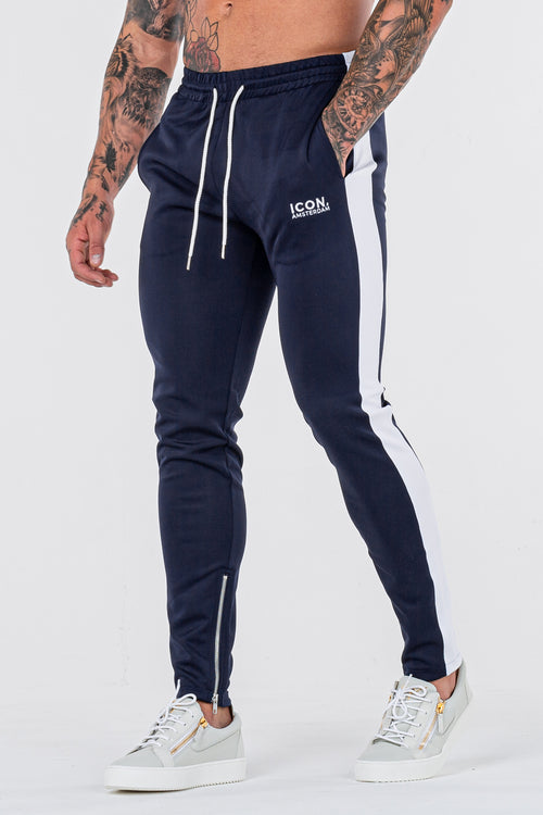 THE ICONIC TRACK PANTS - DONKERBLAUW