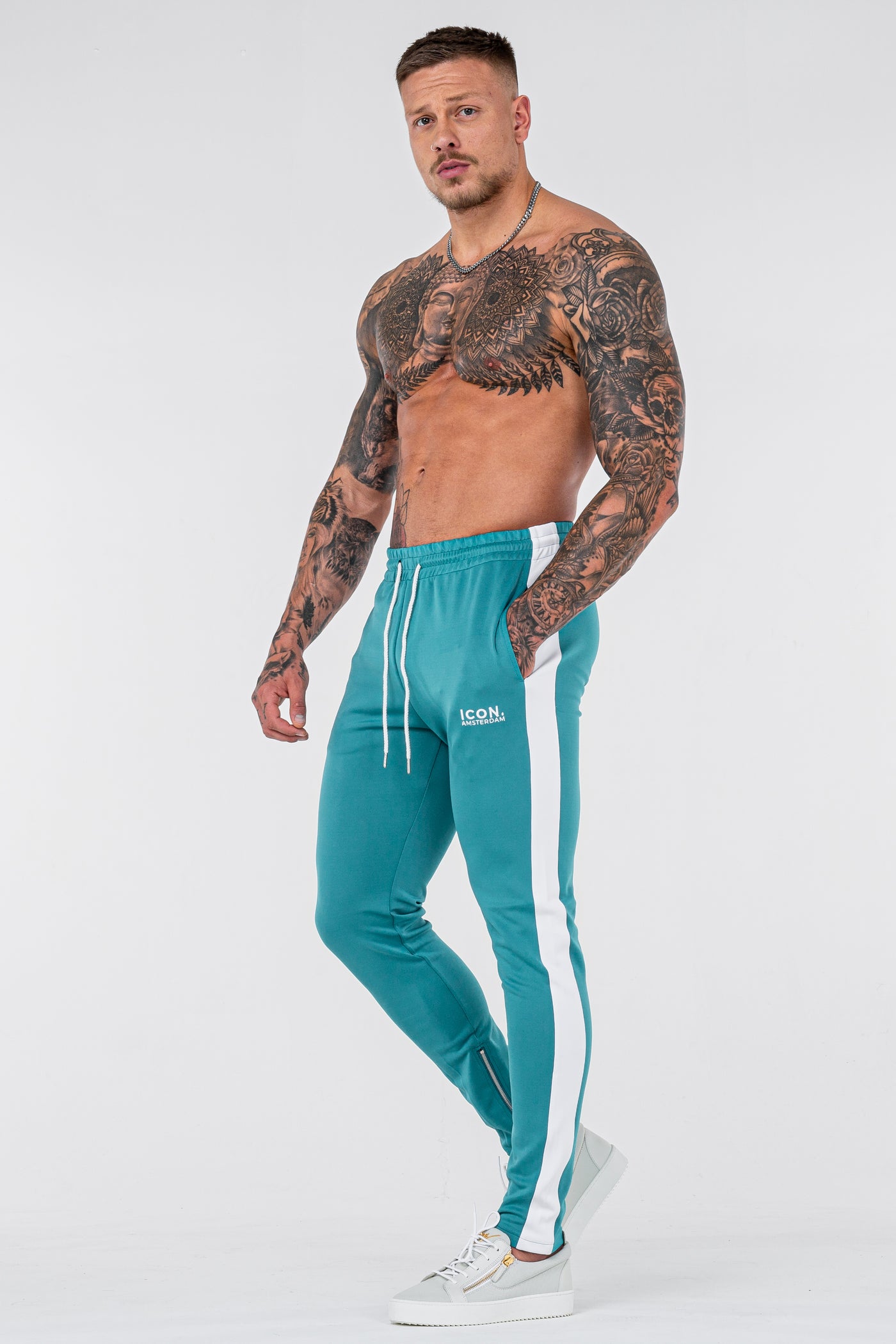 THE ICONIC TRACK PANTS - TURQUOISE - ICON. AMSTERDAM