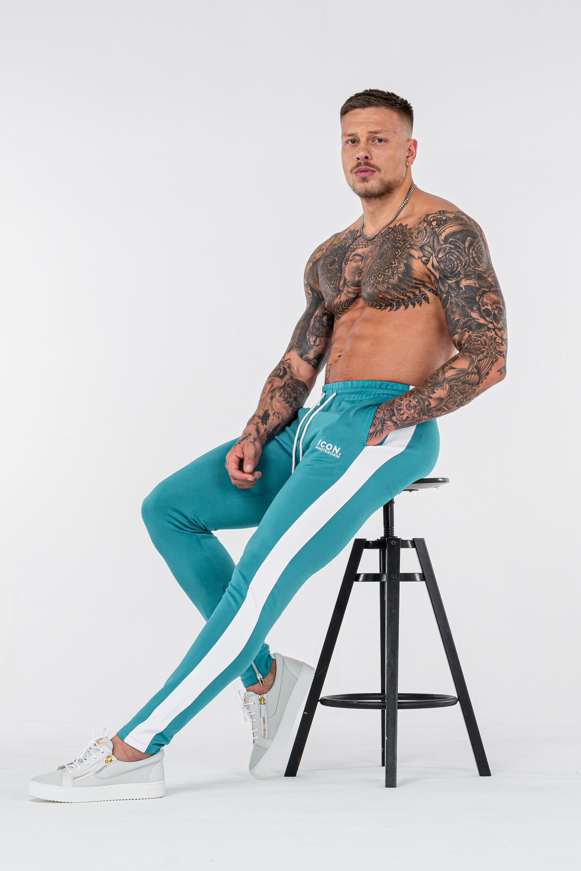 THE ICONIC TRACK PANTS - TURQUOISE - ICON. AMSTERDAM
